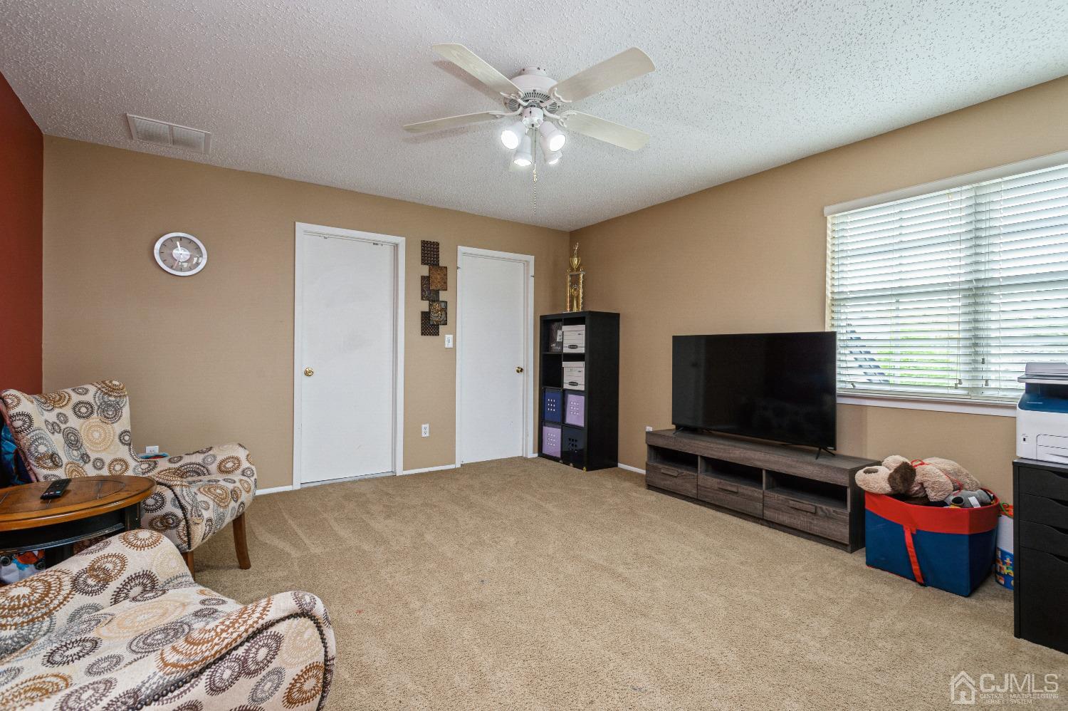 409 Draco Road Piscataway, NJ 08854 - Photo 22 of 28 a bedroom with bed and tv
