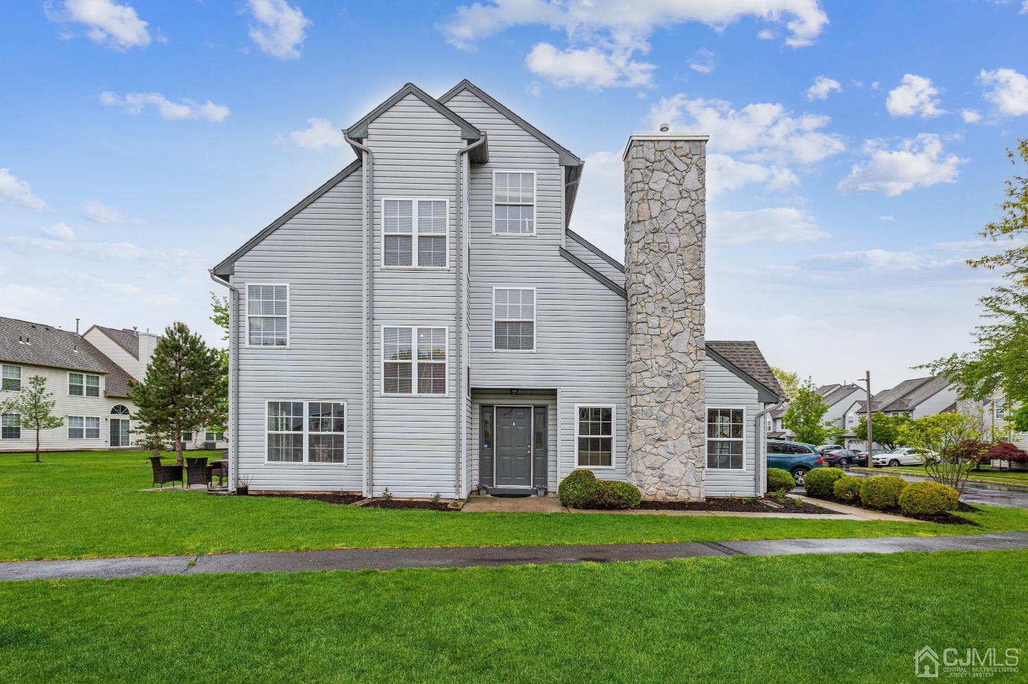 409 Draco Road Piscataway, NJ 08854 - Photo 3 of 28 a front view of a house with a garden