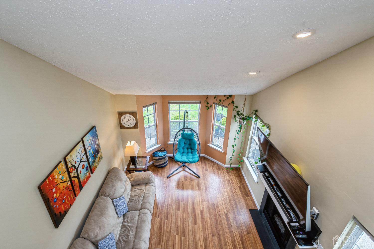 409 Draco Road Piscataway, NJ 08854 - Photo 8 of 28 a living room with furniture and a wooden floor