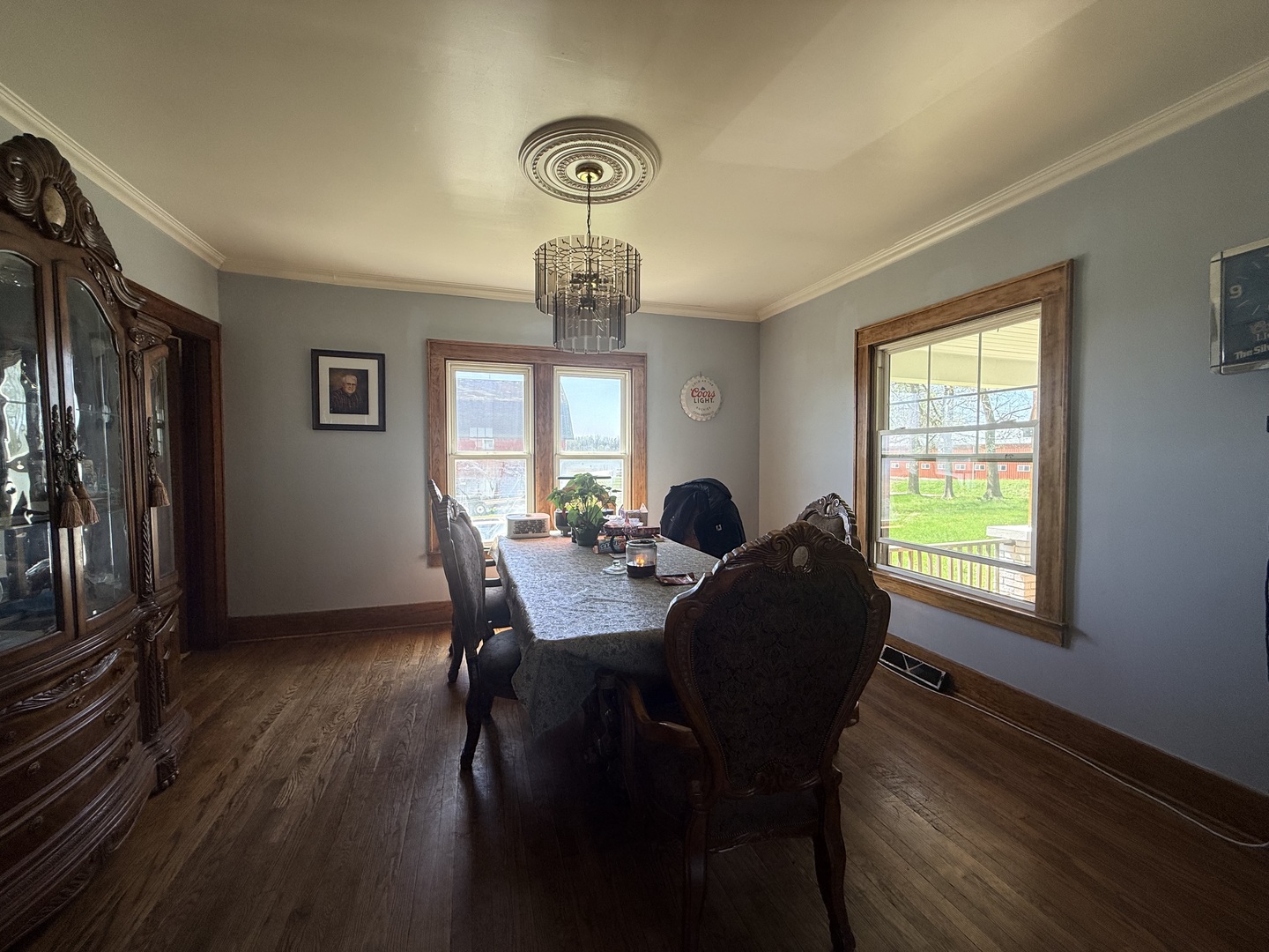 1801 Lee Center Road Amboy, IL 61310 - Photo 15 of 54 a view of a dining room with furniture window and wooden floor
