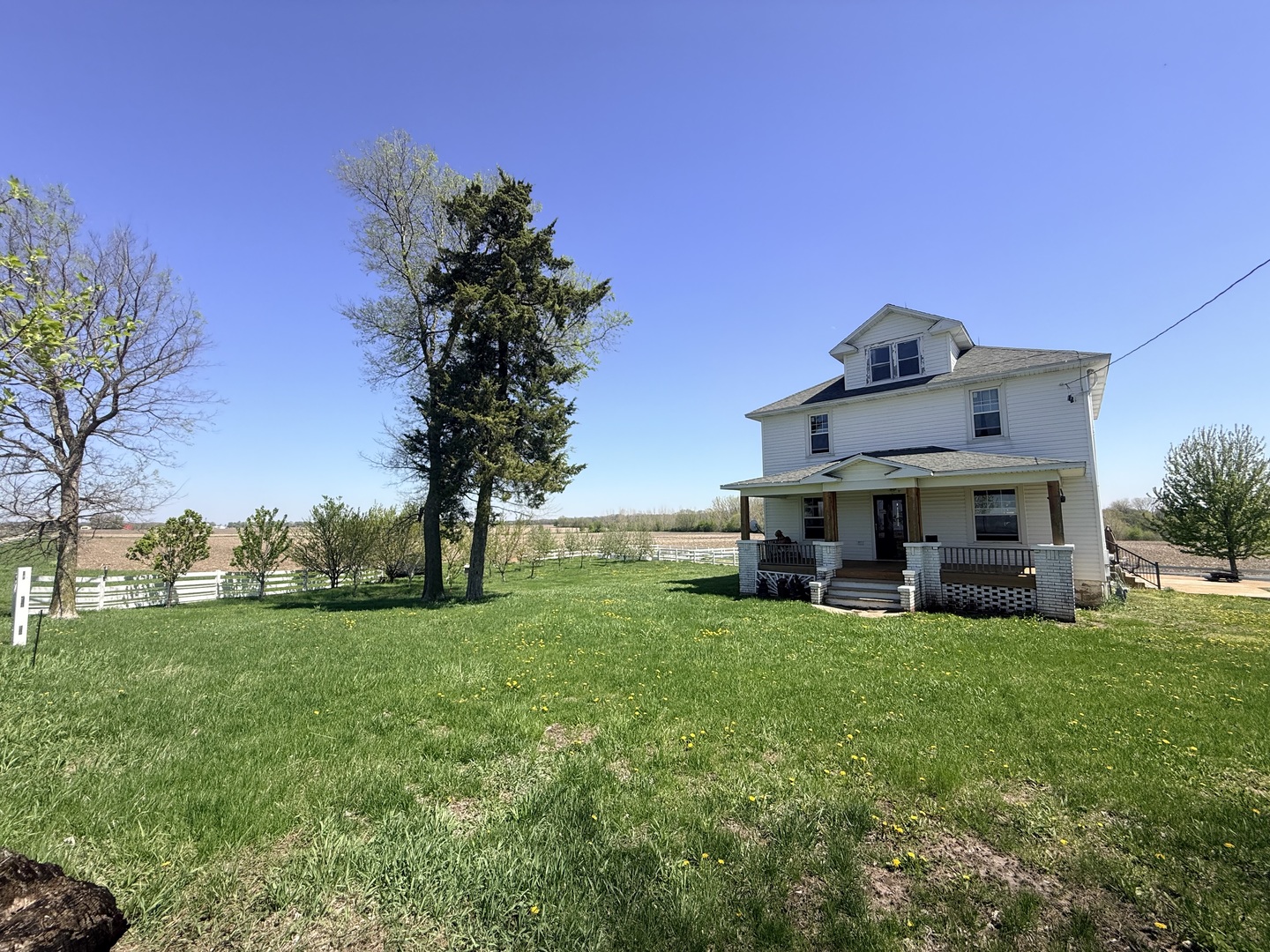 1801 Lee Center Road Amboy, IL 61310 - Photo 2 of 54 a view of a house with a yard