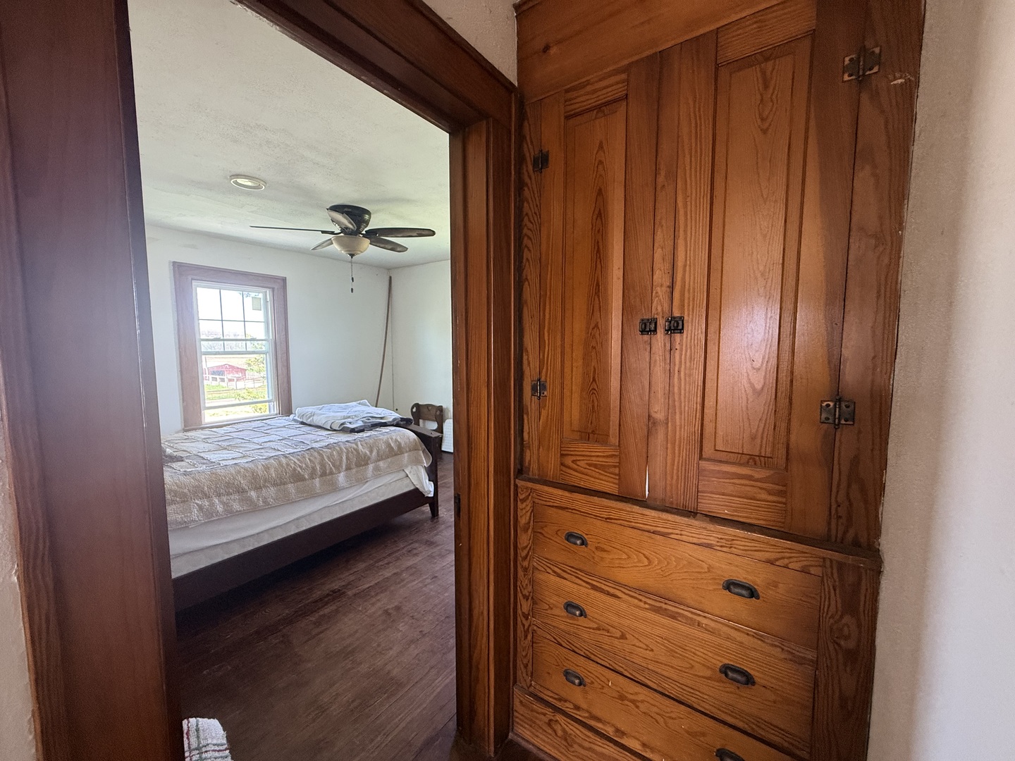 1801 Lee Center Road Amboy, IL 61310 - Photo 27 of 54 a bedroom with a bed and a dresser