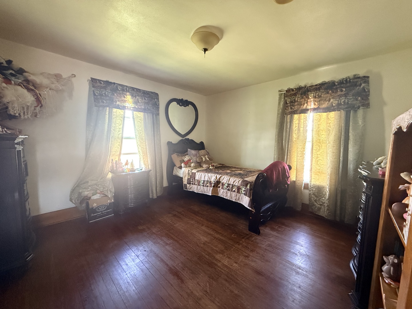 1801 Lee Center Road Amboy, IL 61310 - Photo 29 of 54 a bed room with a bed and a window