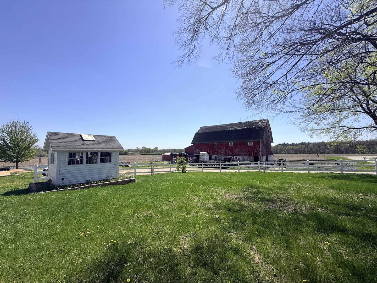 1801 Lee Center Road Amboy, IL 61310 - Photo 3 of 54 a house view with a garden space