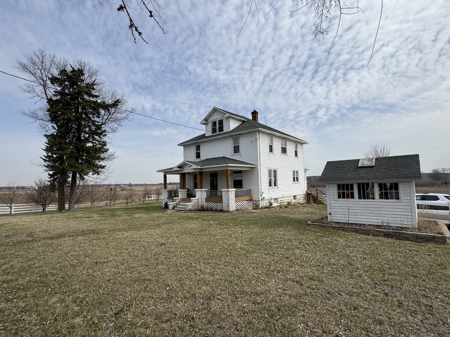 1801 Lee Center Road Amboy, IL 61310 - Photo 32 of 54 a view of a house with a yard