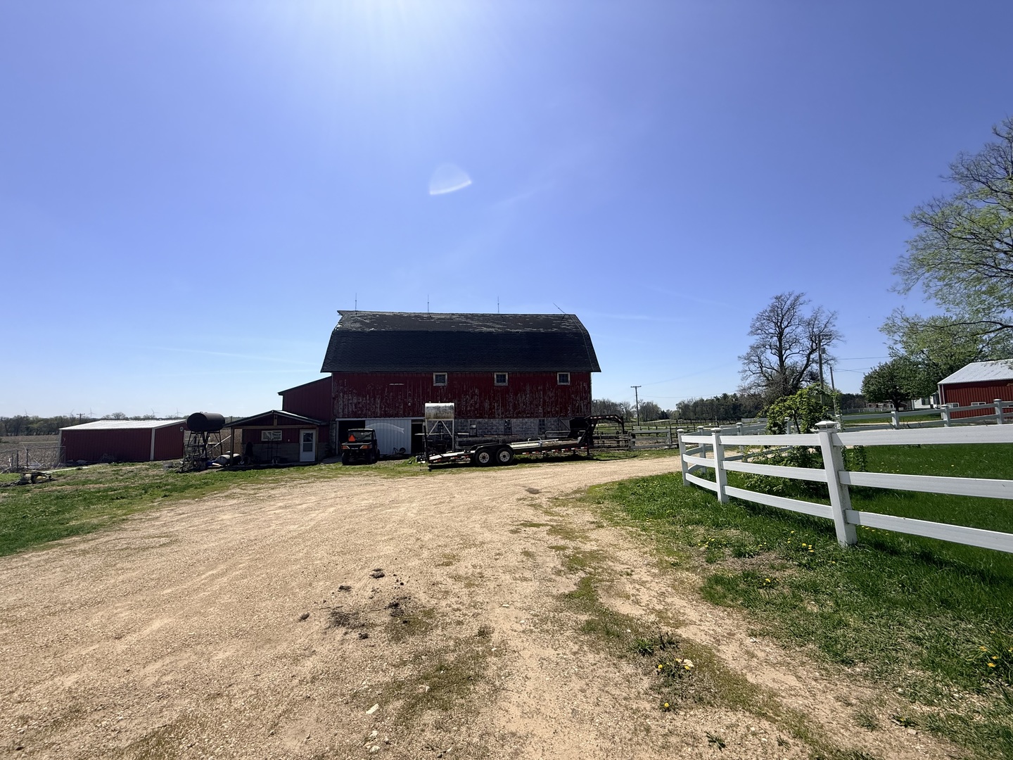 1801 Lee Center Road Amboy, IL 61310 - Photo 5 of 54 a front view of a house with a yard