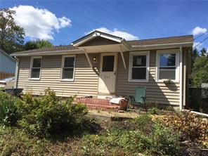 241 Shaw Road Middletown, NY 10941 - Photo 1 of 1 a front view of a house with garden