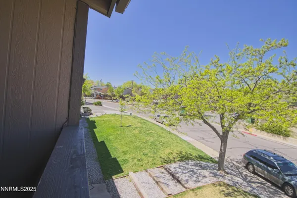 a view of a yard with an outdoor space
