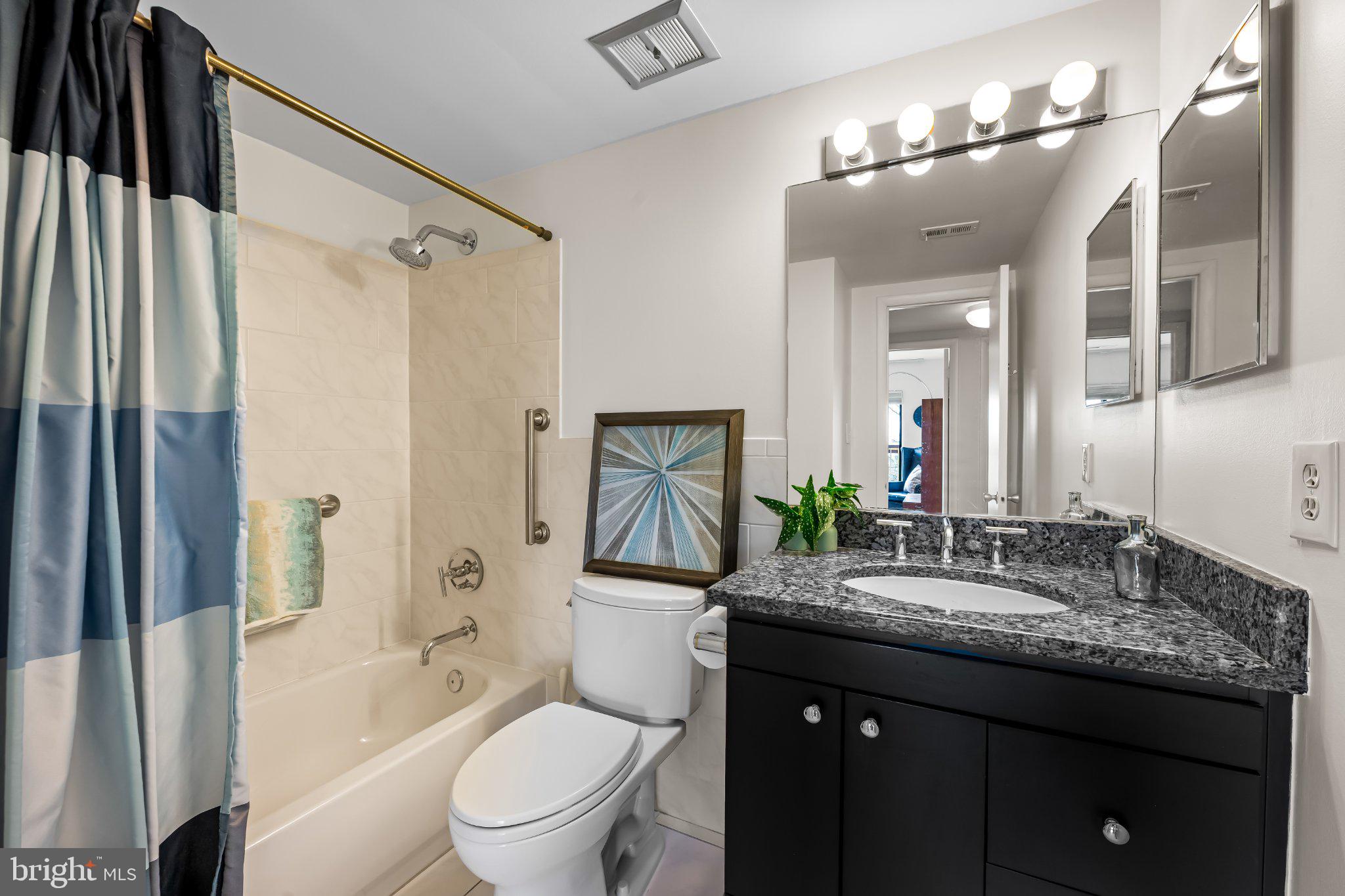 200 Cross Keys Road, Unit R 68 Baltimore, MD 21210 - Photo 12 of 30 Updated bathroom closest to entry for guest use