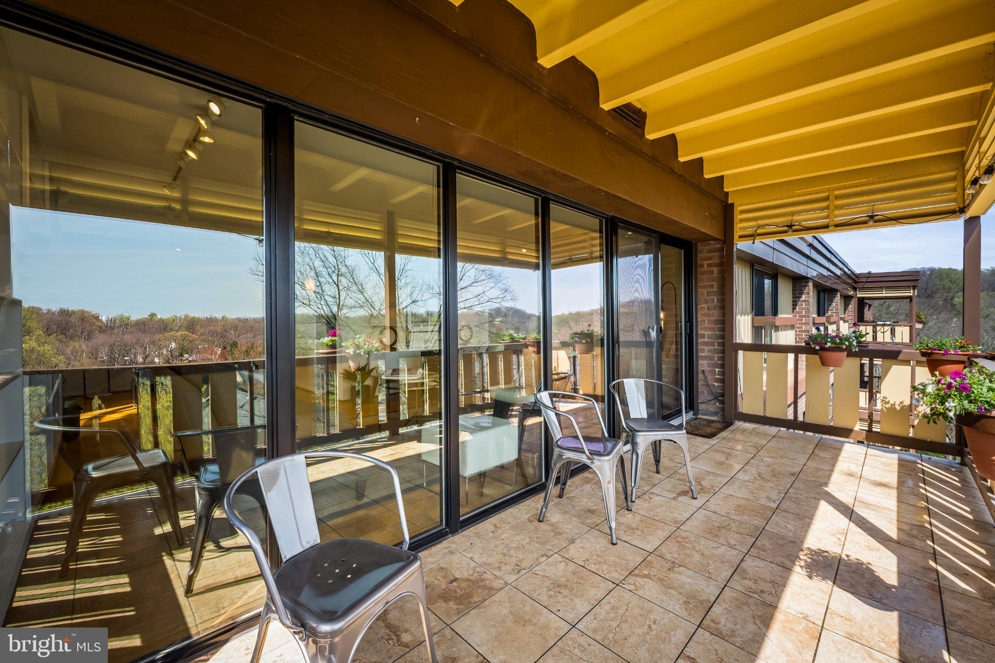 200 Cross Keys Road, Unit R 68 Baltimore, MD 21210 - Photo 3 of 30 Wide large balcony offers easy entertaining space