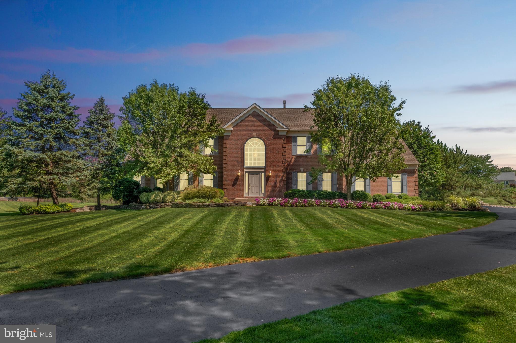 702 Commonwealth Drive Moorestown, NJ 08057 - Photo 1 of 34 a front view of a house with a yard