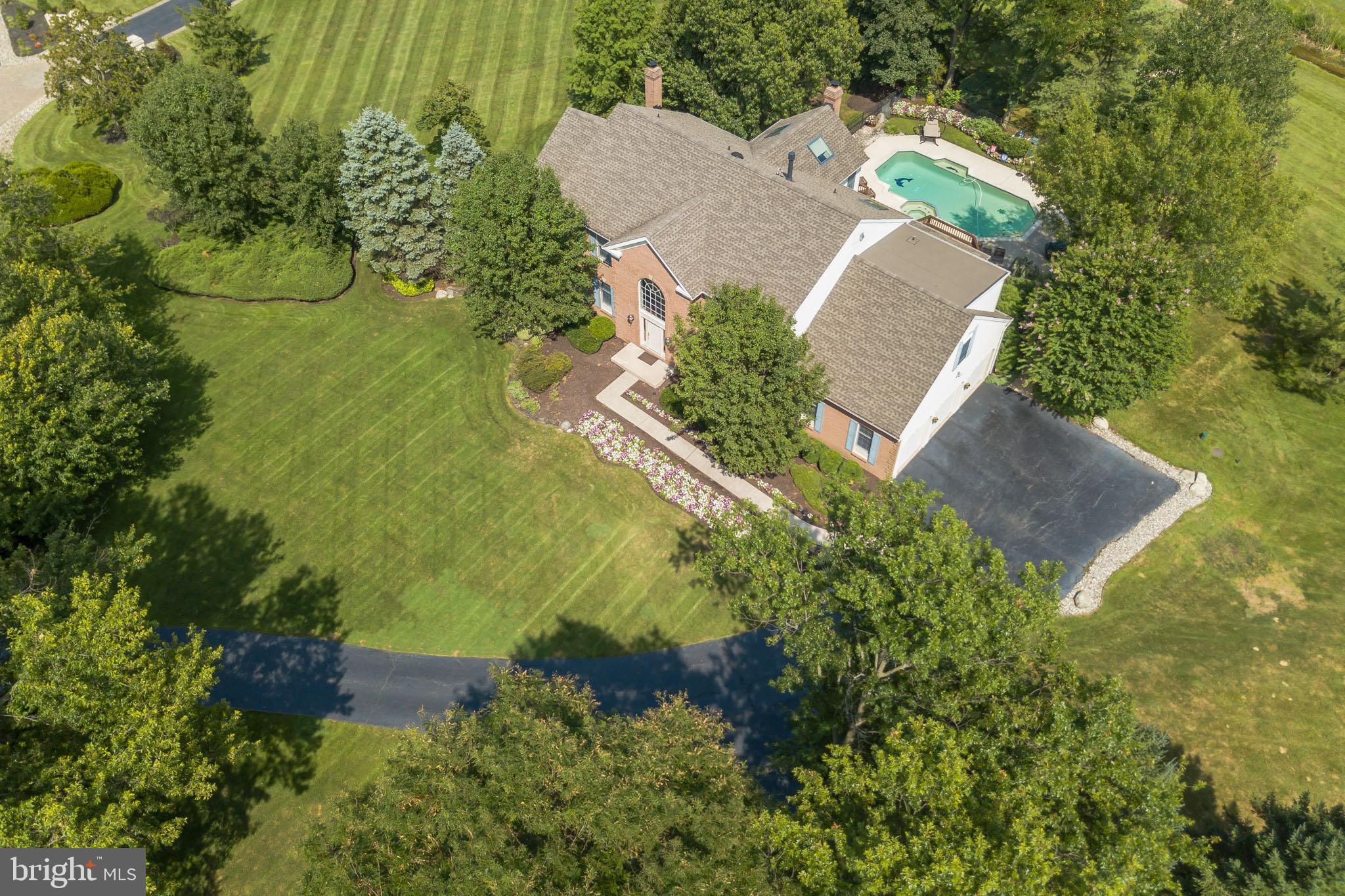 702 Commonwealth Drive Moorestown, NJ 08057 - Photo 2 of 34 an aerial view of a house with a yard
