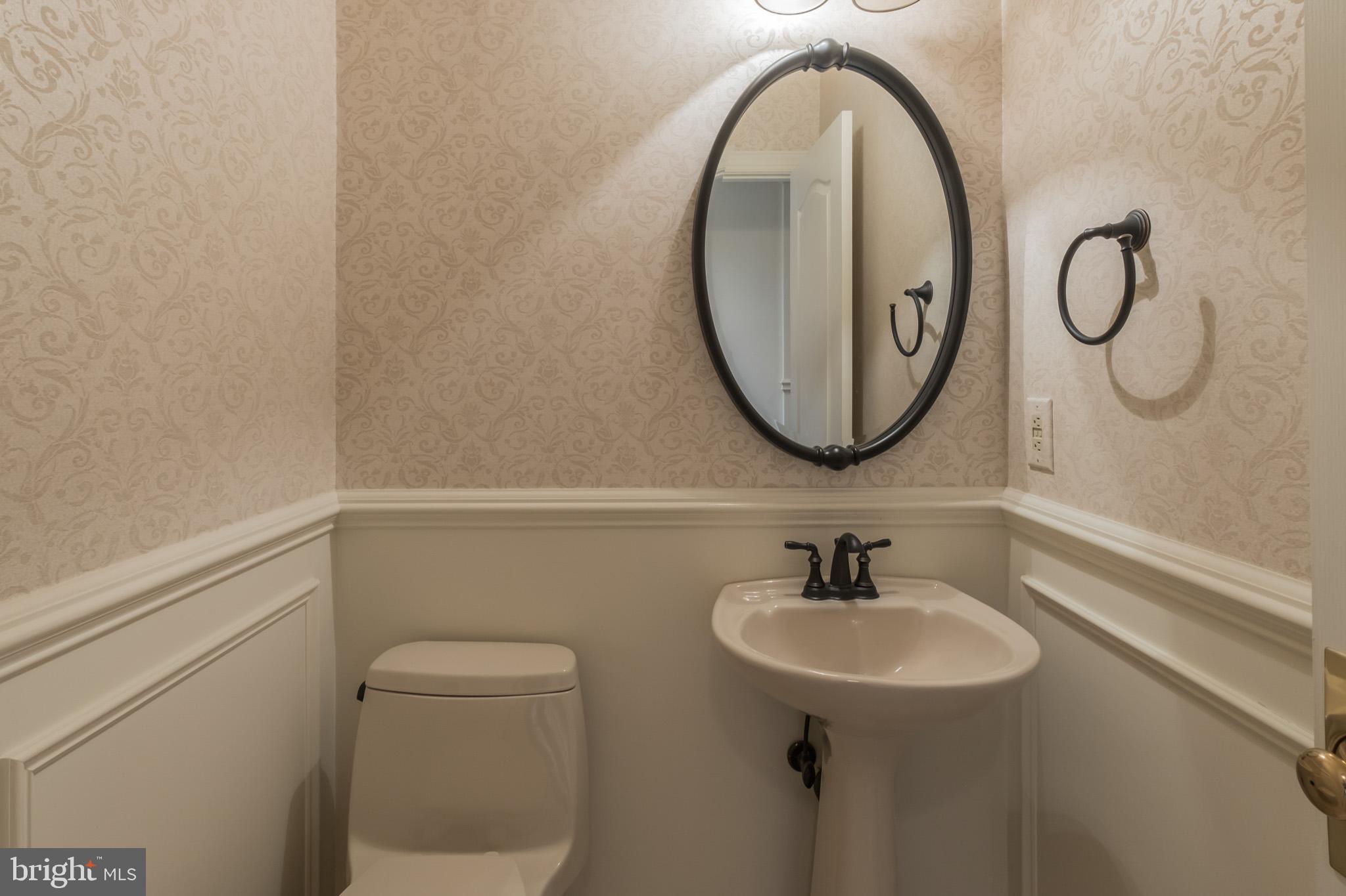 702 Commonwealth Drive Moorestown, NJ 08057 - Photo 18 of 34 a bathroom with a sink and a mirror