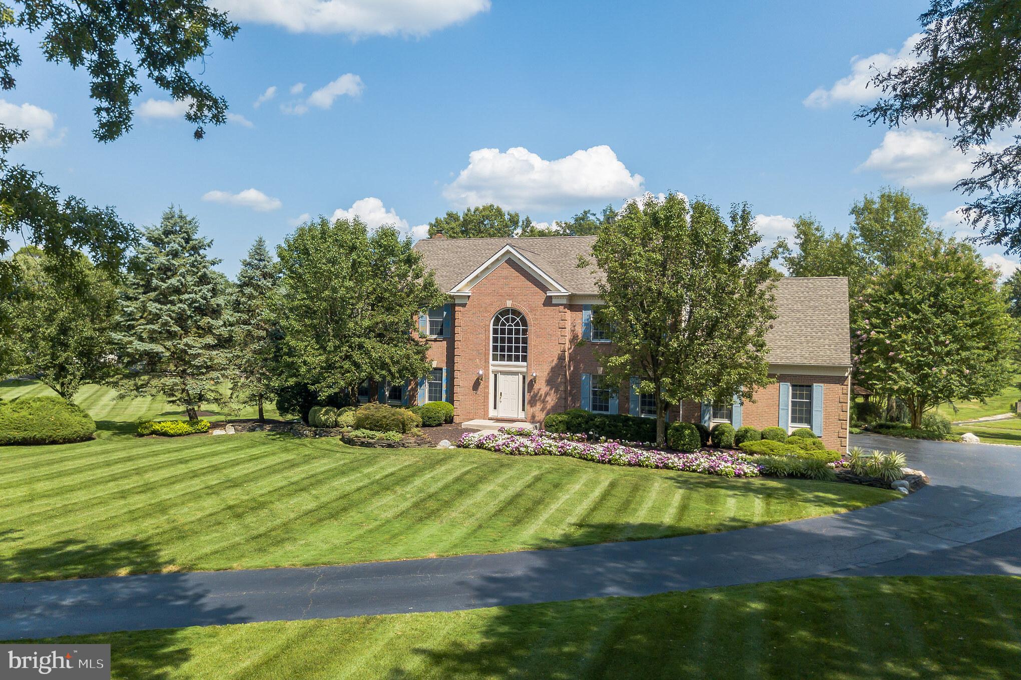 702 Commonwealth Drive Moorestown, NJ 08057 - Photo 3 of 34 a house view with a garden space