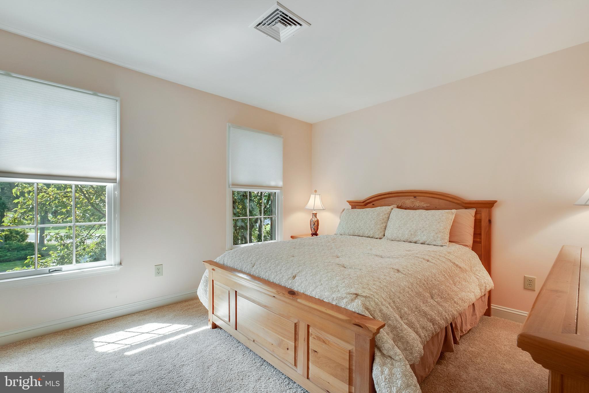 702 Commonwealth Drive Moorestown, NJ 08057 - Photo 25 of 34 a bedroom with a bed and a window