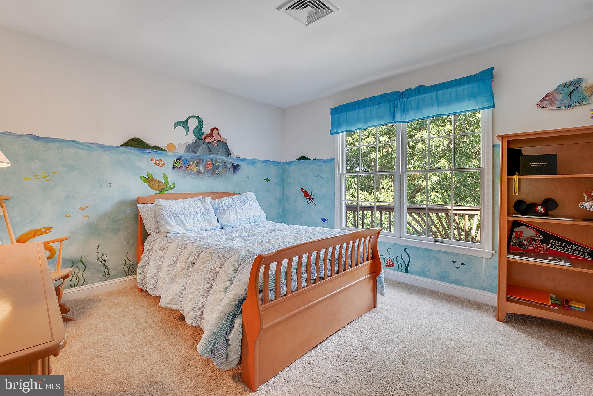 702 Commonwealth Drive Moorestown, NJ 08057 - Photo 27 of 34 a bed sitting in a bedroom next to a window