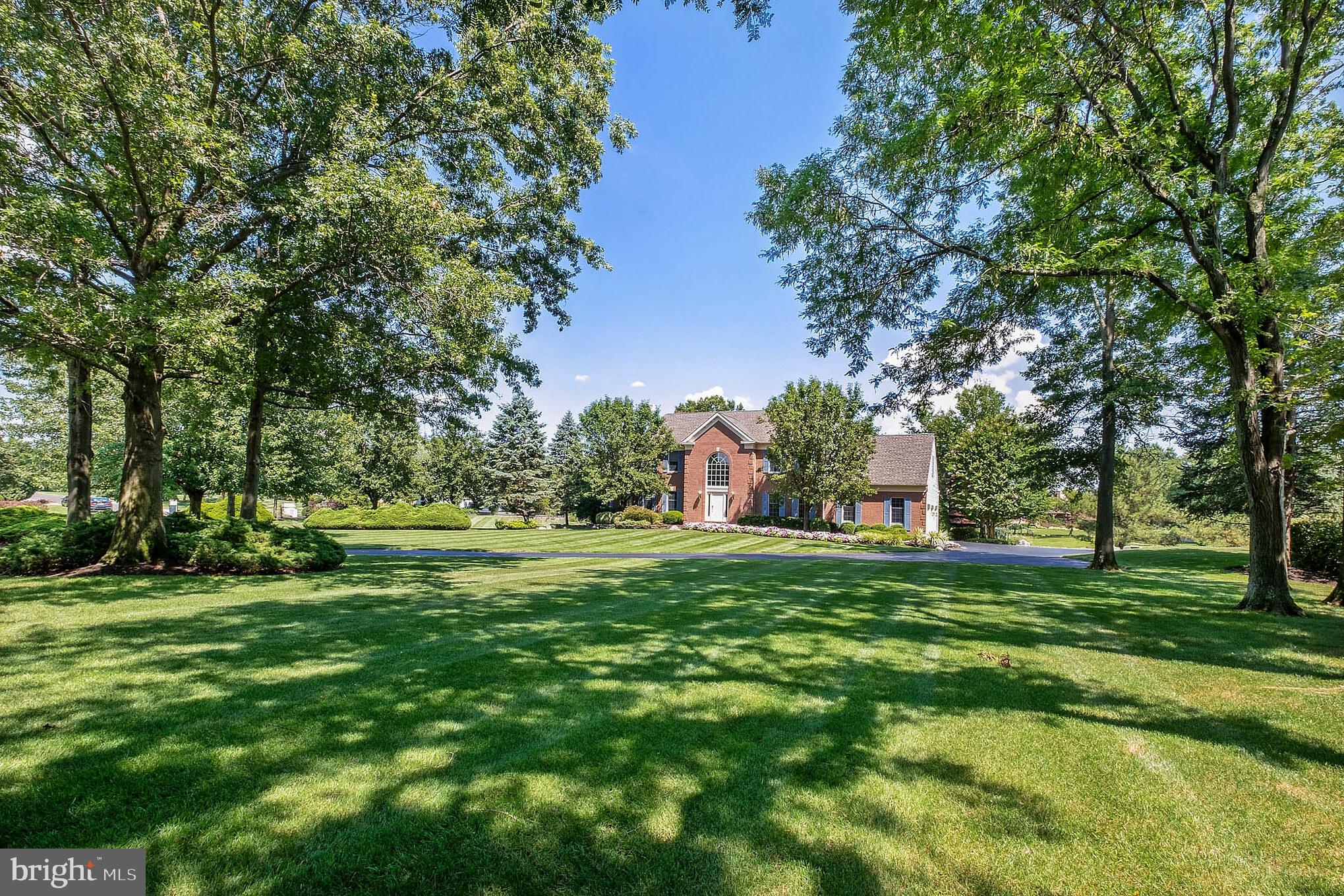 702 Commonwealth Drive Moorestown, NJ 08057 - Photo 34 of 34 a big yard with lots of green space and trees