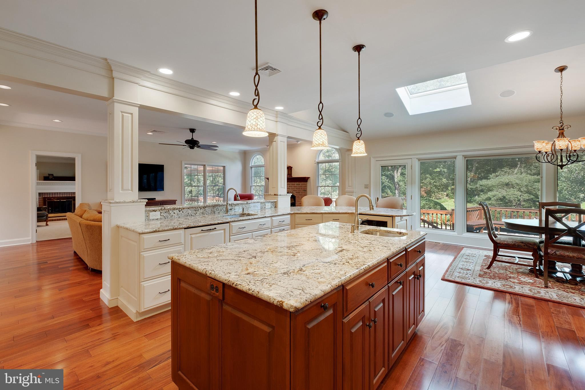 702 Commonwealth Drive Moorestown, NJ 08057 - Photo 9 of 34 a large kitchen with kitchen island a large island in it
