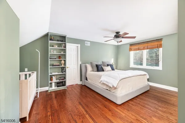 a view of a big yard in front of the house