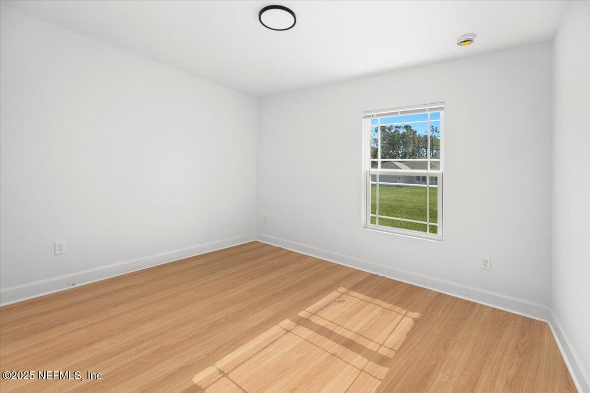 5432 Laredo Street Keystone Heights, FL 32656 - Photo 11 of 23 a view of an empty room with a window