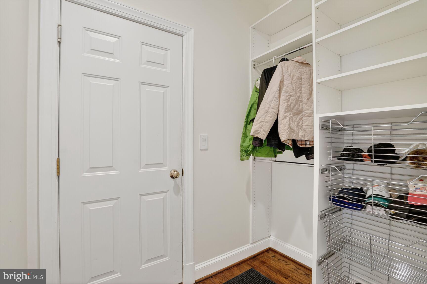 4837 W Street Northwest Washington, DC 20007 - Photo 21 of 51 a view of walk in closet with clothes and shoes