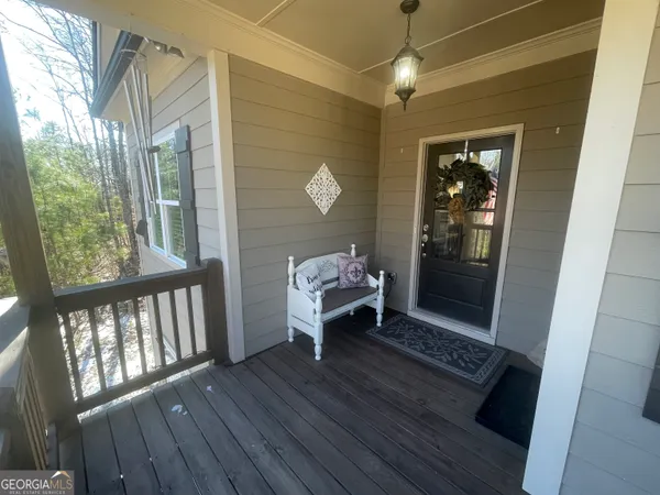 a dining room with a table and chairs