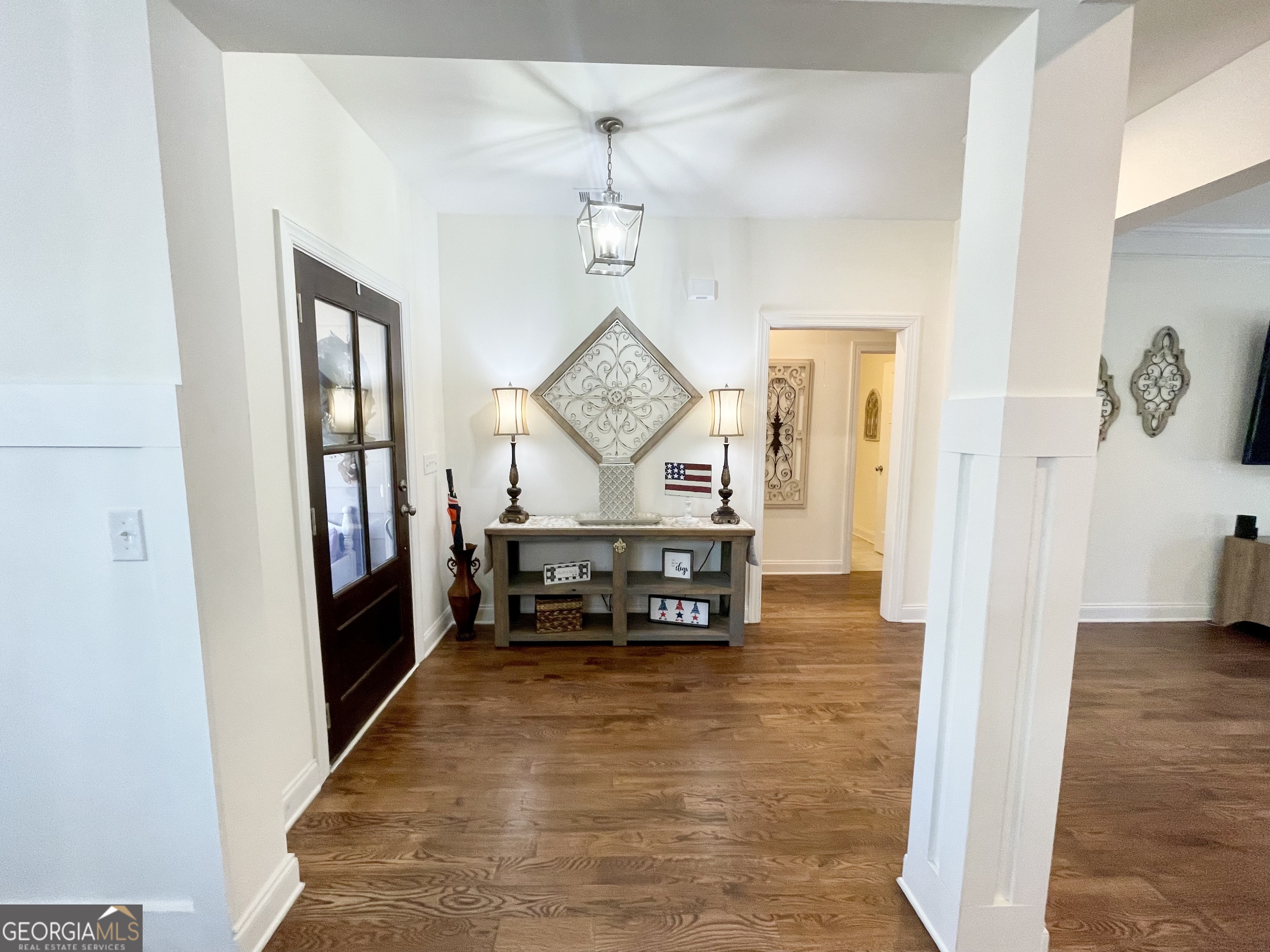 143 Spring Lake Trail White, GA 30184 - Photo 13 of 45 a view of entryway livingroom and hall with wooden floor