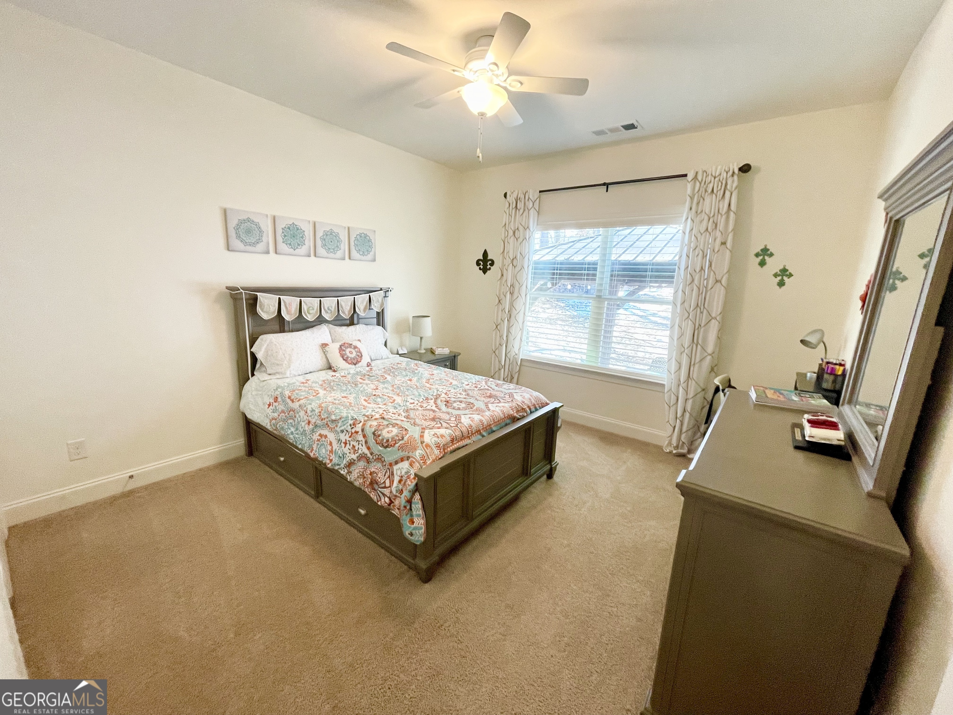 143 Spring Lake Trail White, GA 30184 - Photo 14 of 45 a bedroom with a bed and a walk in closet