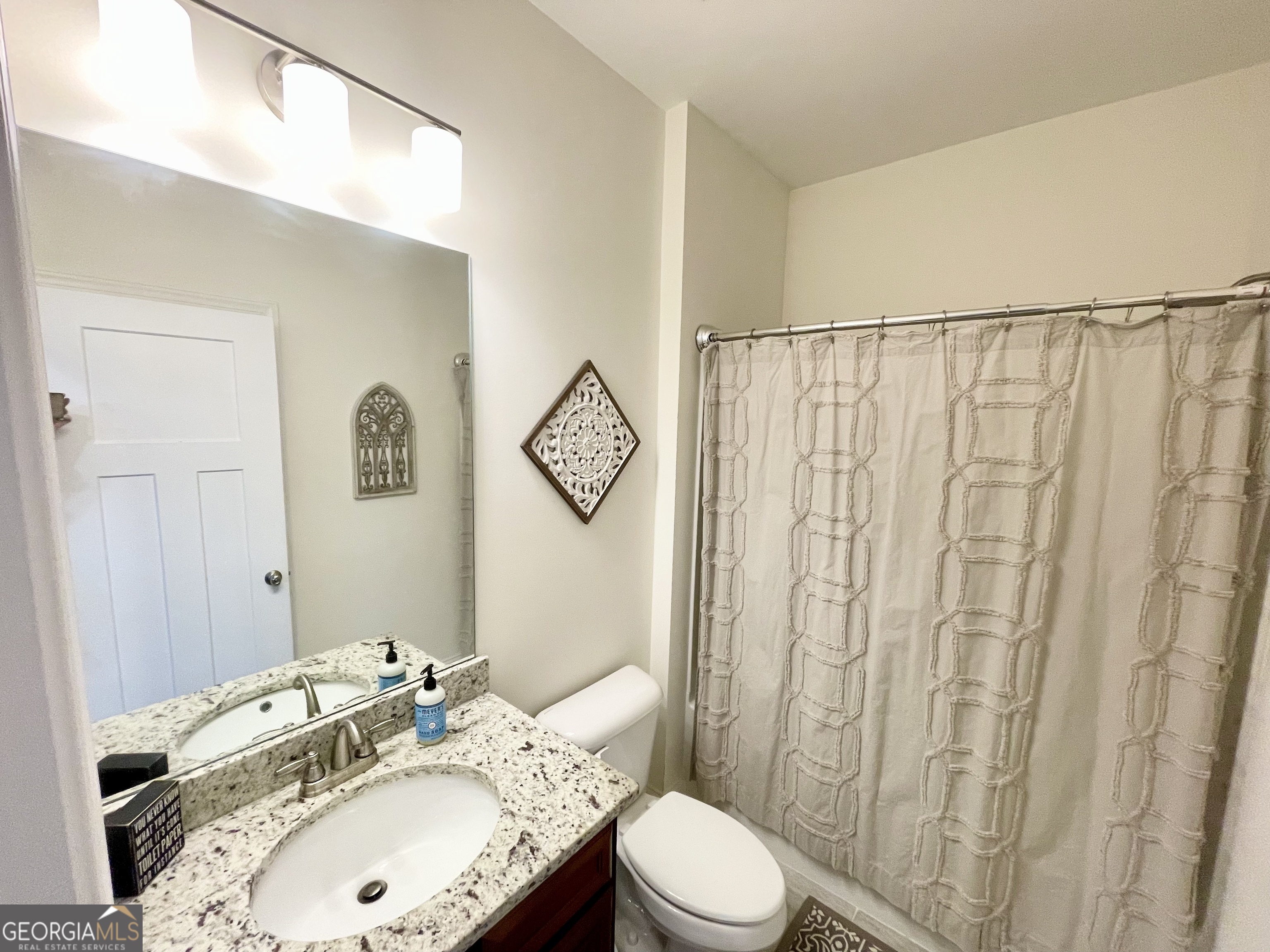 143 Spring Lake Trail White, GA 30184 - Photo 16 of 45 a bathroom with a sink toilet and shower