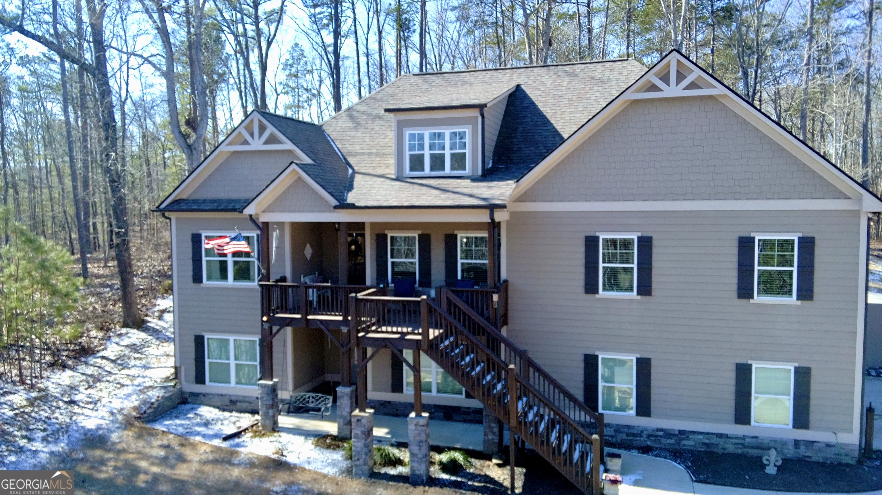 143 Spring Lake Trail White, GA 30184 - Photo 2 of 45 a view of a house with large windows and a tree