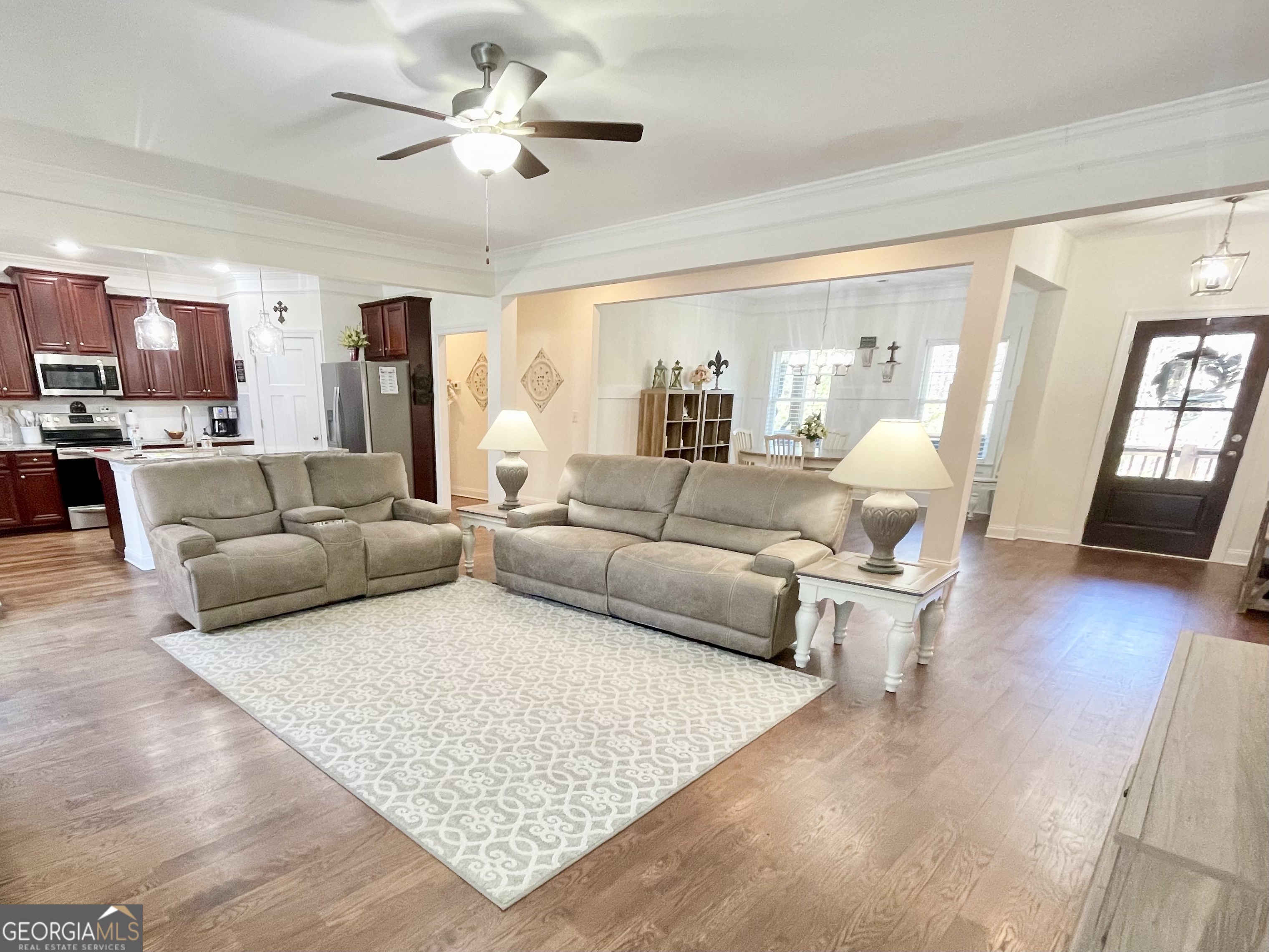 143 Spring Lake Trail White, GA 30184 - Photo 22 of 45 a living room with furniture and a wooden floor