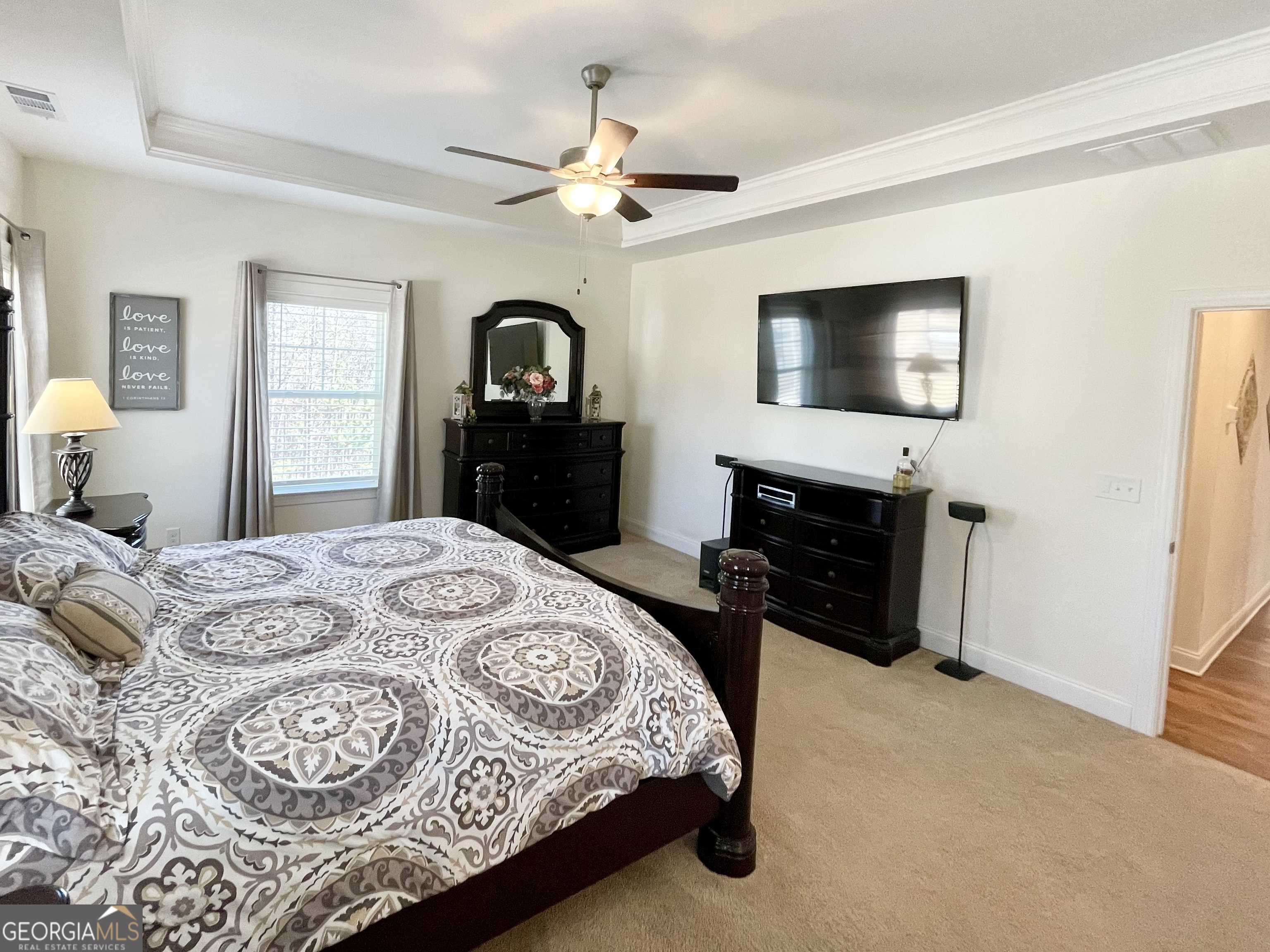 143 Spring Lake Trail White, GA 30184 - Photo 31 of 45 a bedroom with a bed and a television