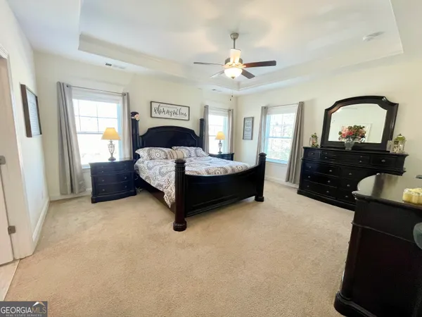 a bathroom with a shower and a bathtub