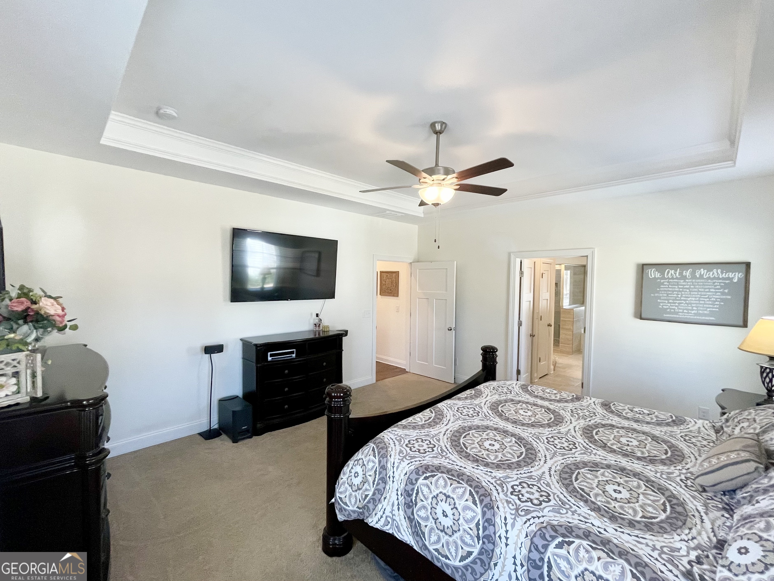 143 Spring Lake Trail White, GA 30184 - Photo 32 of 45 a bedroom with a bed and a flat screen tv