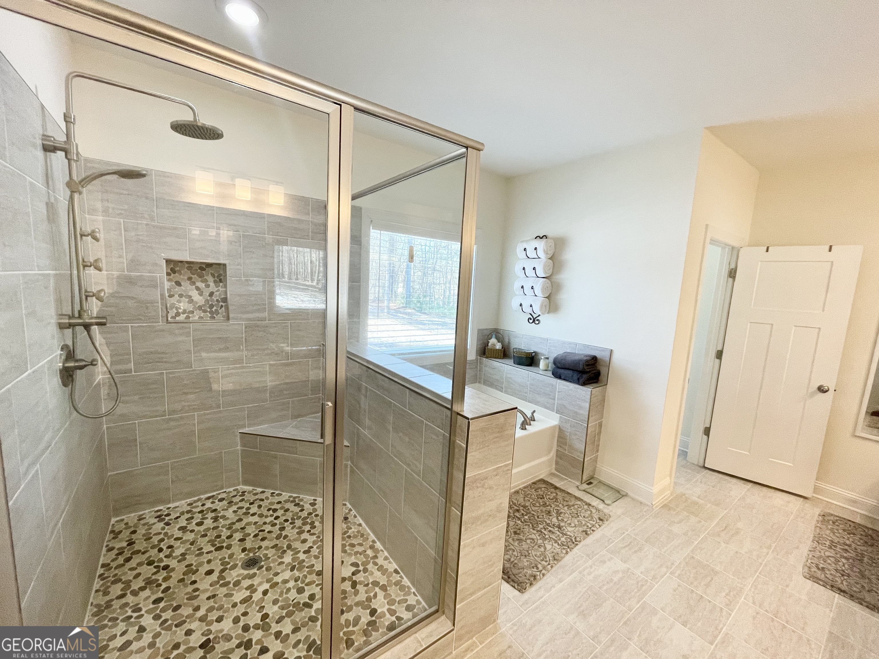 143 Spring Lake Trail White, GA 30184 - Photo 35 of 45 a bathroom with a shower and a sink