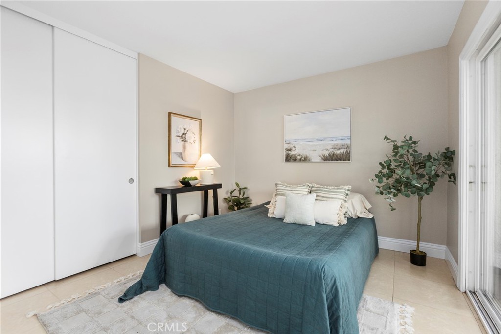 143 Timberline Court Brea, CA 92821 - Photo 11 of 35 a bedroom with a bed and a potted plant