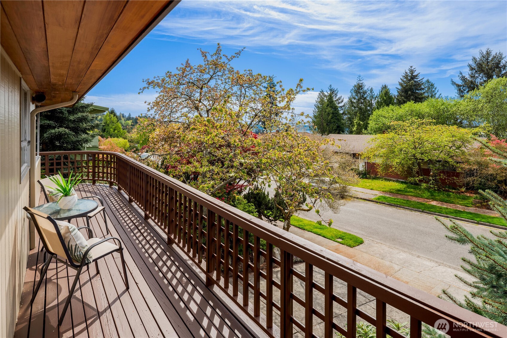 4241 Southwest Donovan Street Seattle, WA 98136 - Photo 11 of 40 a view of balcony with wooden floor and outdoor seating