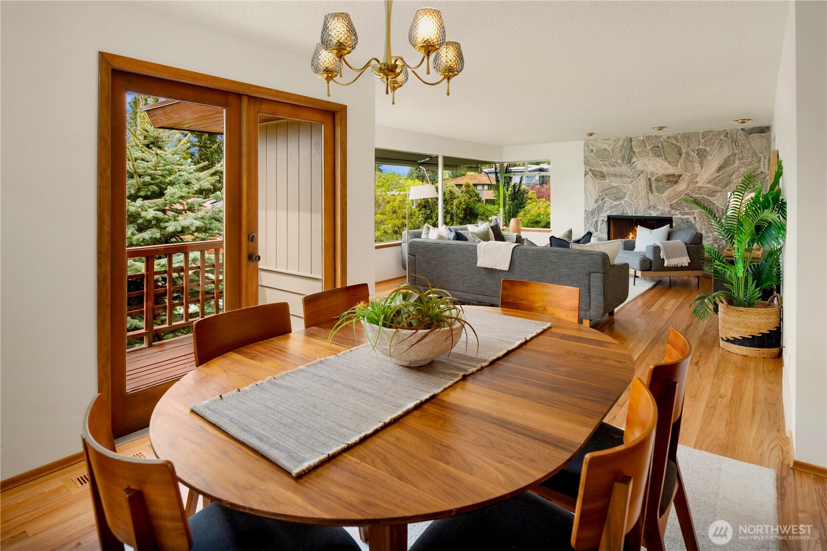 4241 Southwest Donovan Street Seattle, WA 98136 - Photo 12 of 40 a view of a dining room with furniture window and wooden floor