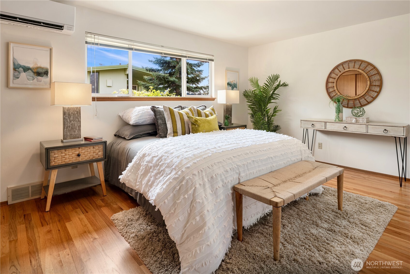 4241 Southwest Donovan Street Seattle, WA 98136 - Photo 20 of 40 a bedroom with a bed a dresser and chair