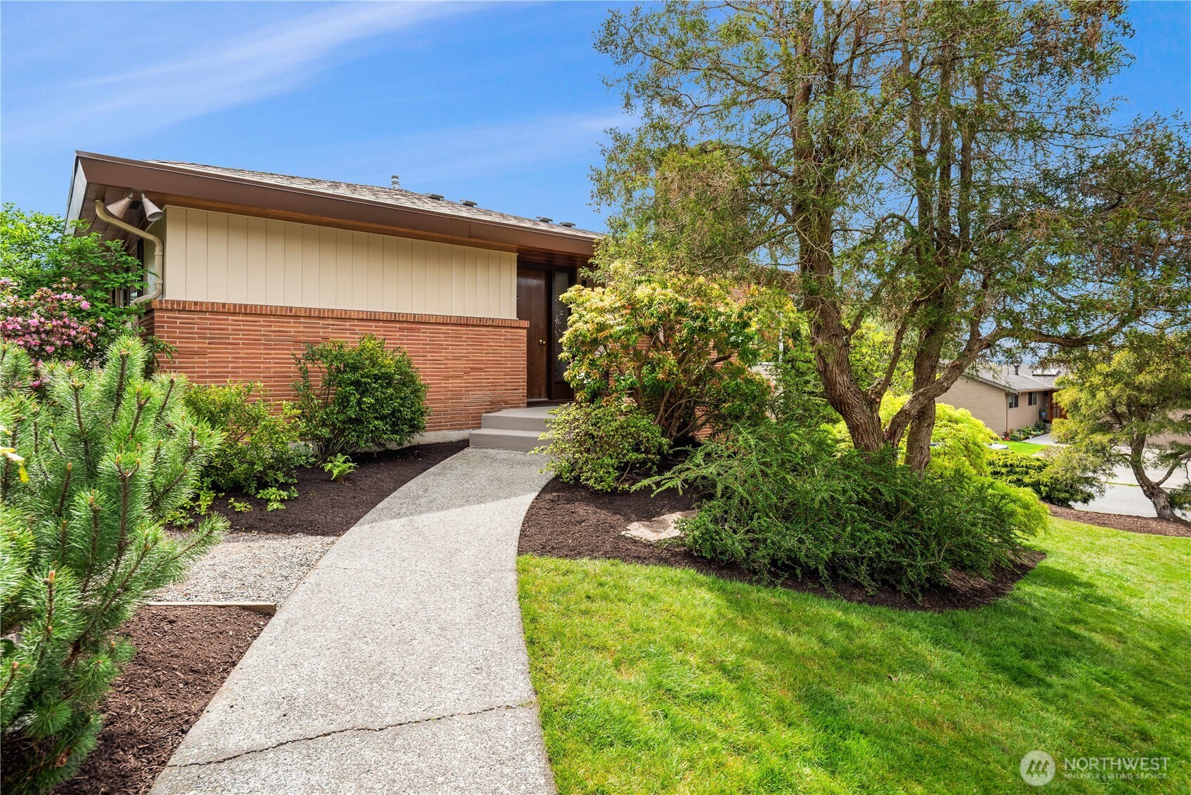 4241 Southwest Donovan Street Seattle, WA 98136 - Photo 3 of 40 a front view of a house with garden