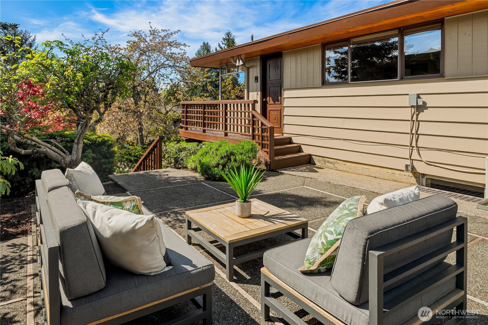 4241 Southwest Donovan Street Seattle, WA 98136 - Photo 33 of 40 a view of a patio with two chairs and a table