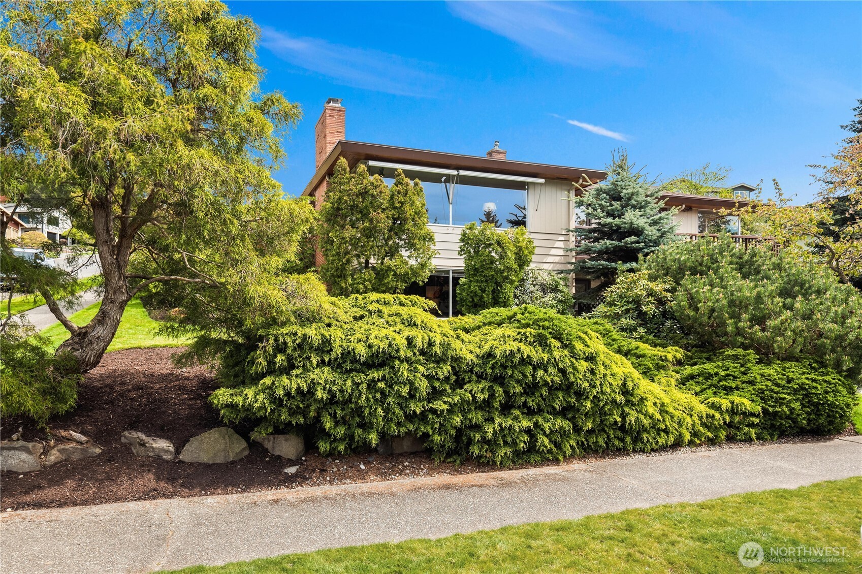 4241 Southwest Donovan Street Seattle, WA 98136 - Photo 40 of 40 a view of a house with a yard