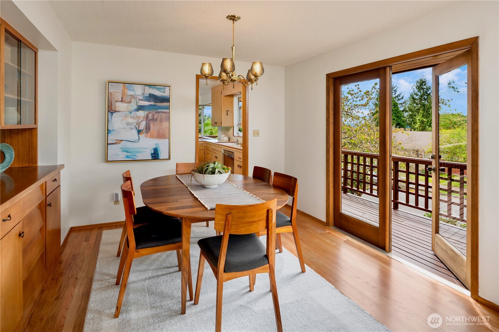 4241 Southwest Donovan Street Seattle, WA 98136 - Photo 10 of 40 a view of a dining room with furniture window and wooden floor