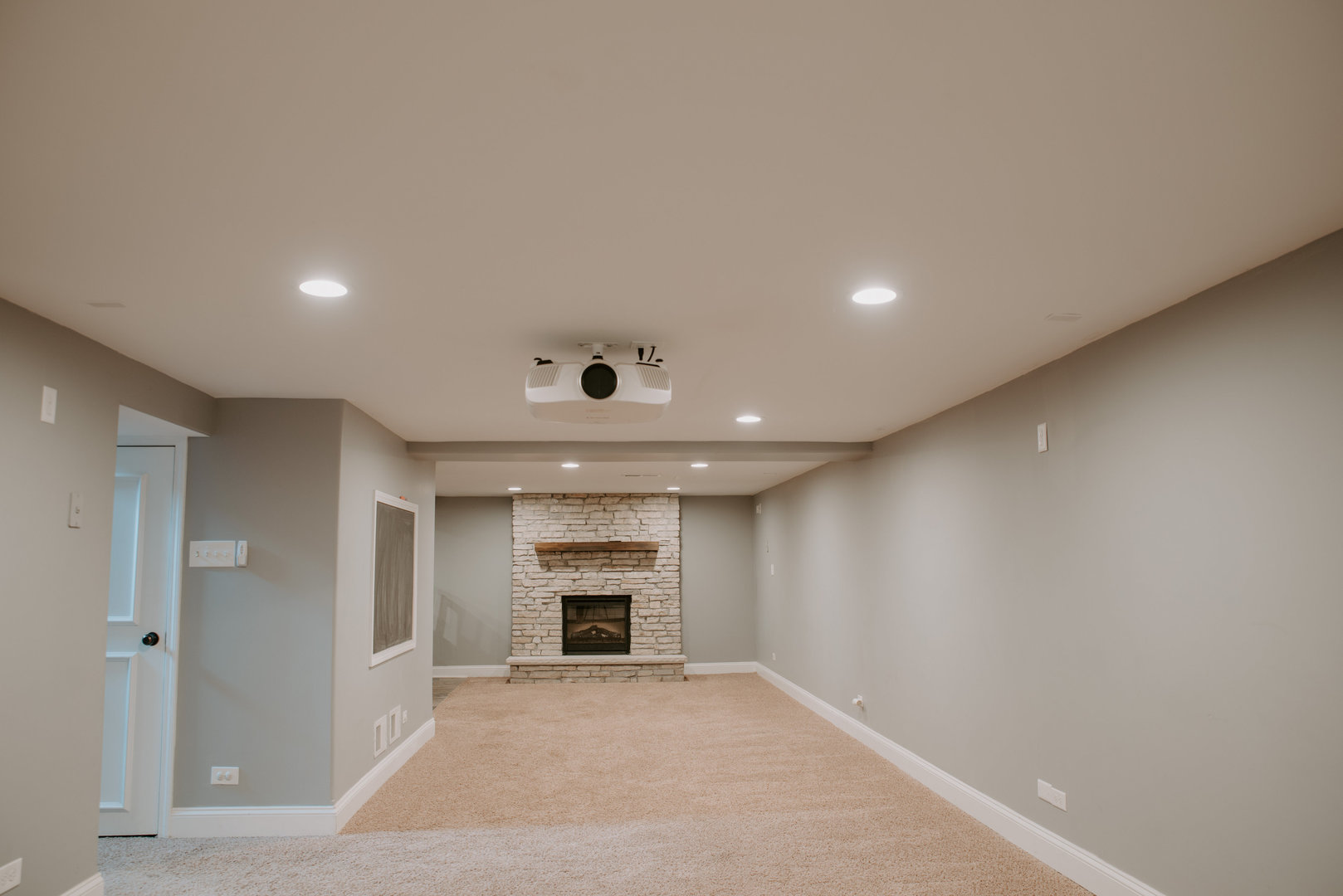 906 Sunset Road Wheaton, IL 60189 - Photo 19 of 32 an empty room with fireplace and a window
