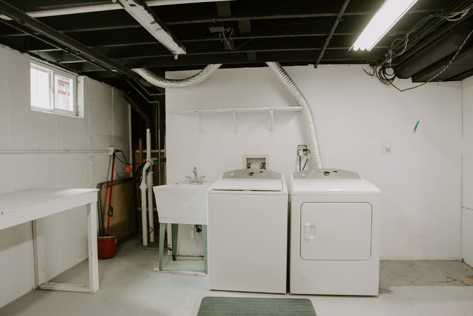 906 Sunset Road Wheaton, IL 60189 - Photo 25 of 32 a utility room with dryer and washer