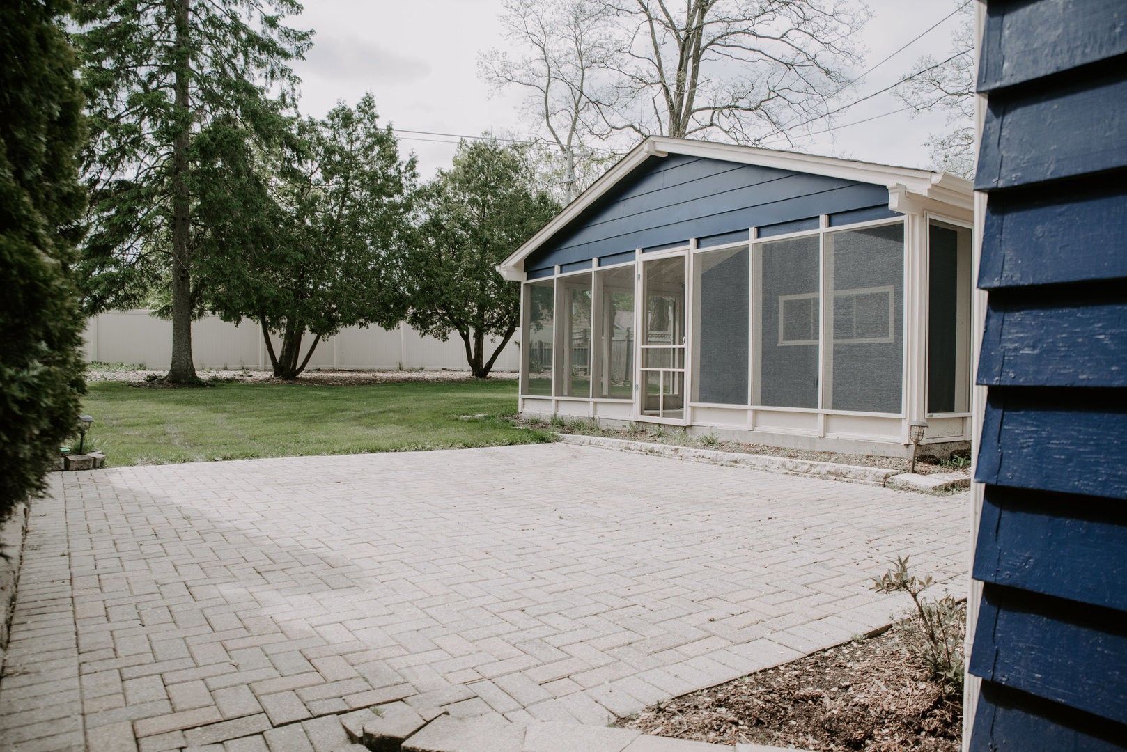 906 Sunset Road Wheaton, IL 60189 - Photo 29 of 32 a front view of a house with a garden and trees
