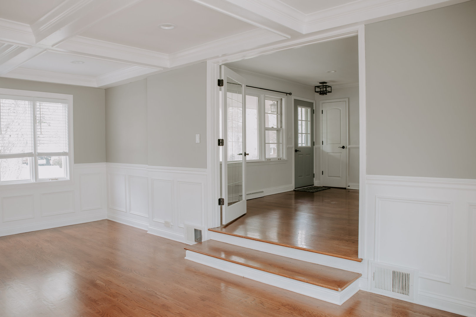 906 Sunset Road Wheaton, IL 60189 - Photo 6 of 32 an empty room with wooden floor and windows