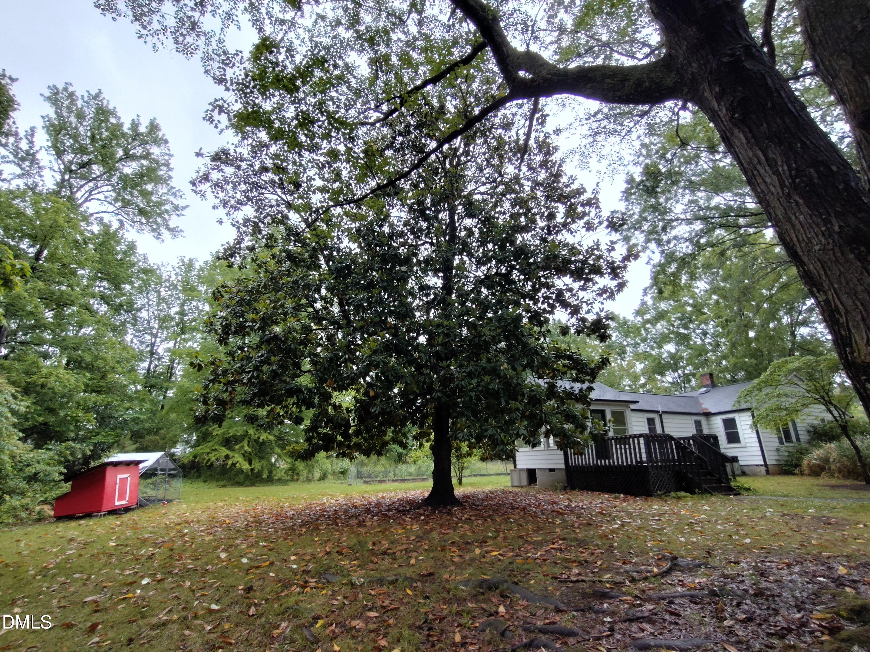 808 Glenco Road Durham, NC 27703 - Photo 7 of 17 a view of a house with a yard