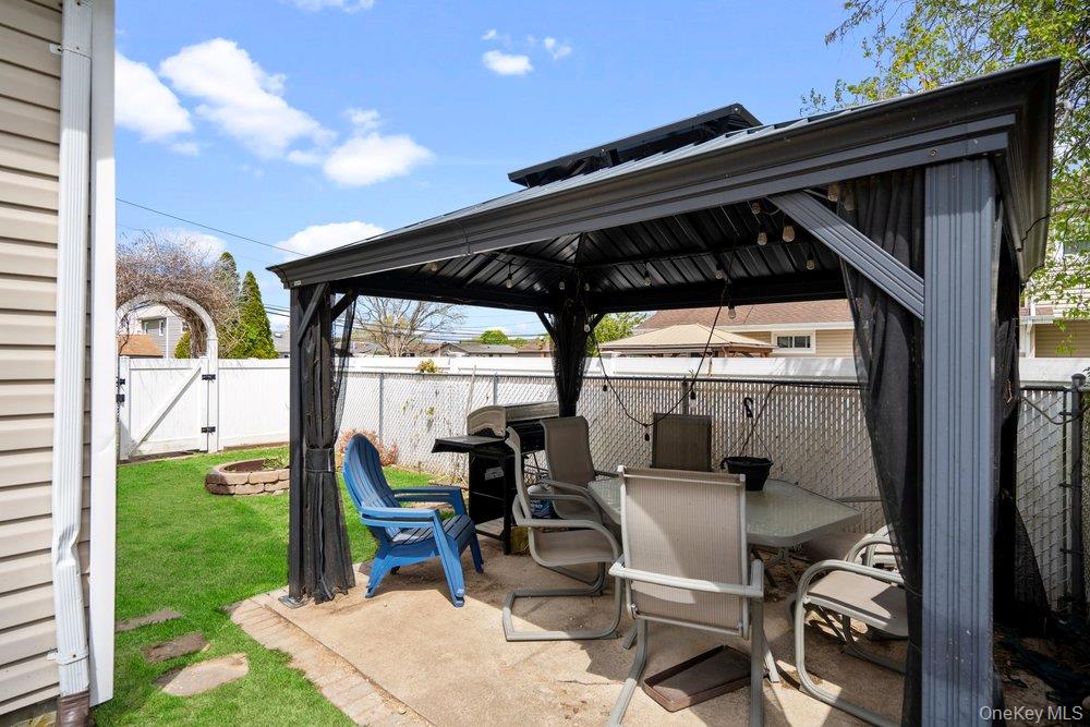 101 Sexton Road West Babylon, NY 11704 - Photo 32 of 33 a view of sitting area with furniture and garden