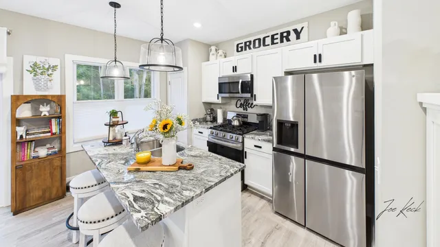 $399,900 | 7230 Atwater Springs Drive, Norton Shores, MI 49456